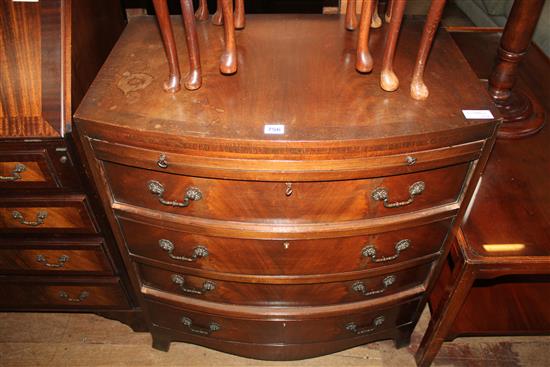 Small mahogany bow front chest with slide and four long drawers